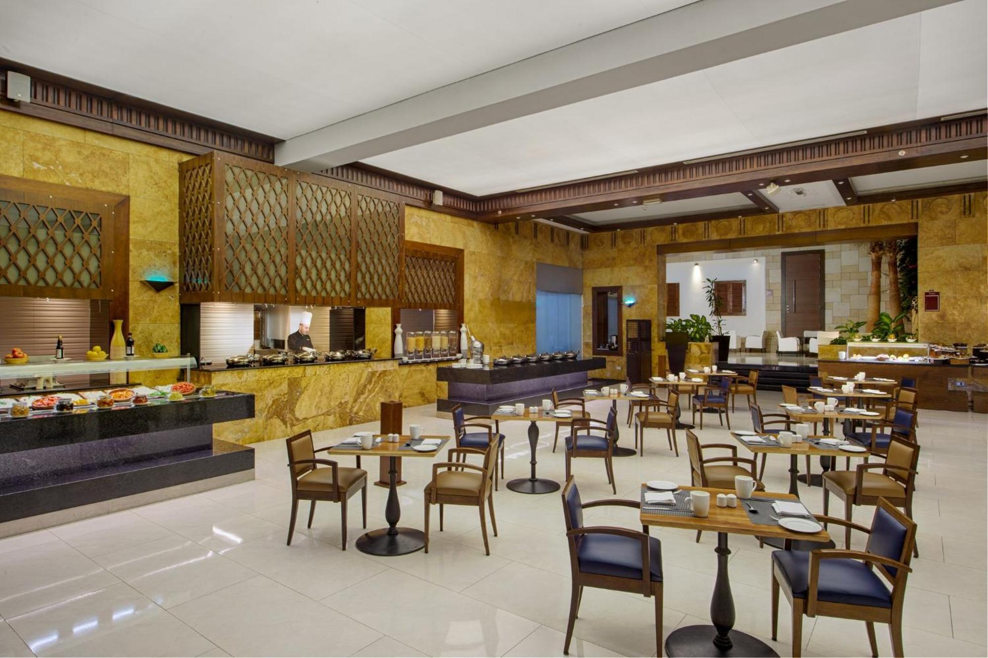 Crowne Plaza Amman By Ihg Hotel Exterior foto The restaurant